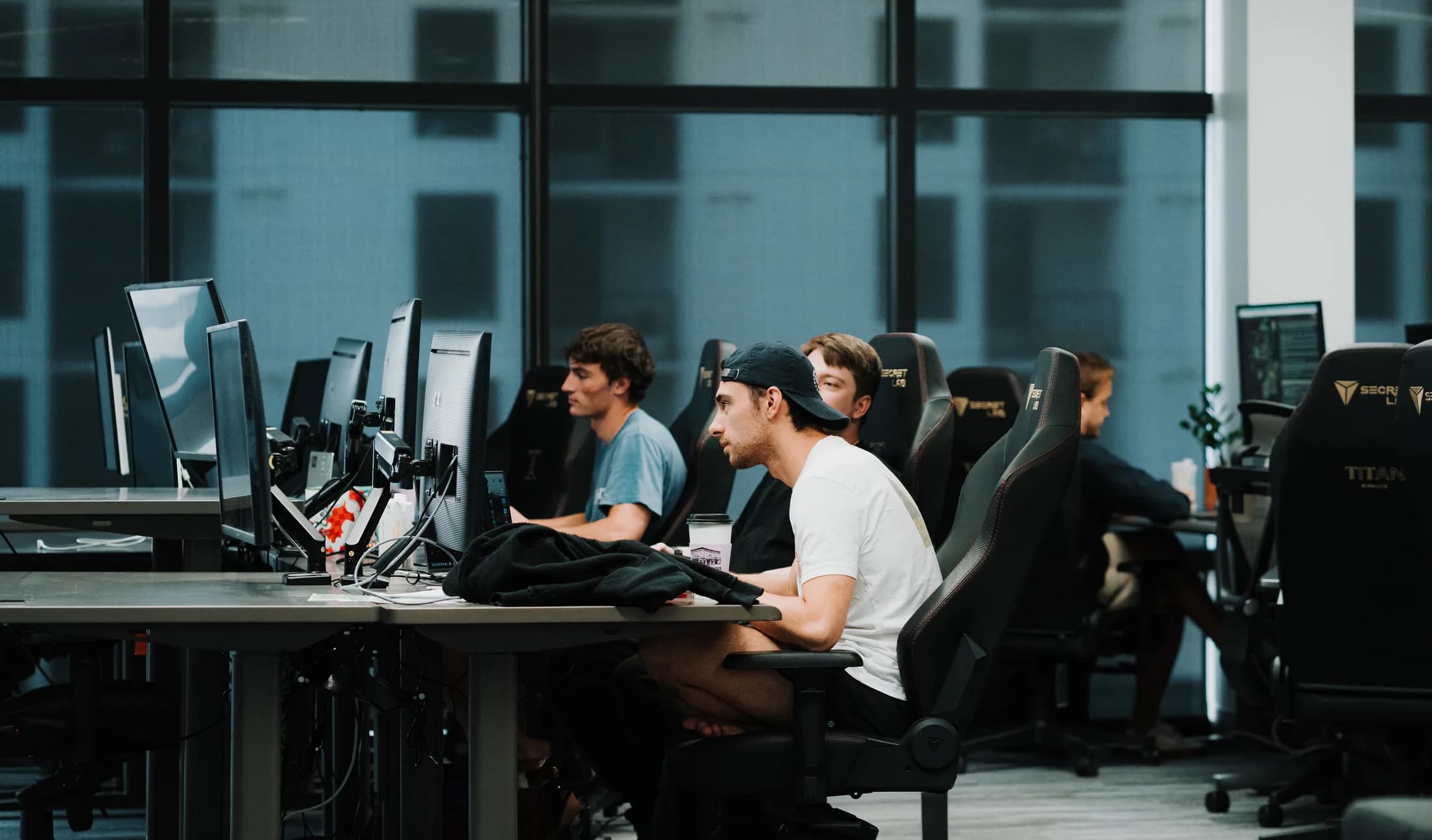 People working together at the furnished desks